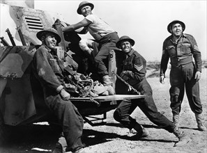 Allan Joslyn, Henry Fonda, Thomas Mitchell, on-set of the Film, "Immortal Sergeant", 20th Century Fox, 1943
