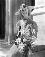 Anita Louise, American Actress, Portrait Holding Bouquet of Flowers, 1936