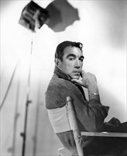 Anthony Quinn, Portrait Sitting in Director's Chair, 1957