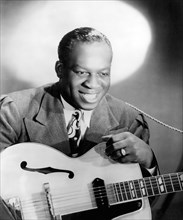 Jimmy Liggins, American R&B Guitarist and Bandleader, Portrait with Guitar, circa 1940's