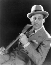 Warren William, American Actor, Portrait Smoking Cigarette, ca. 1934