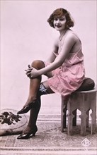 Lingerie Model Sitting on Stool, circa 1920