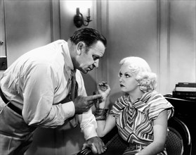Wallace Beery, Jean Harlow, on-set of the Film, "China Seas", 1935