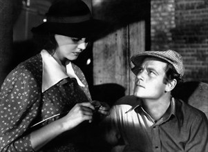 Sylvia Sidney, Joel McCrea, on-set of the Film, "Dead End", 1937