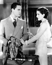 Chester Morris, Norma Shearer, on-set of the Film, "The Divorcee", 1930