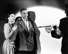 Patricia Morison, Alan Curtis, on-set of the Film, "Hitler's Madman", 1943