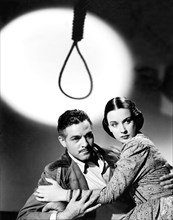 Alan Curtis, Patricia Morison, on-set of the Film, "Hitler's Madman", 1943