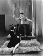 Alma Rubens, John Gilbert, on-set of the Silent Film, "The Masks of the Devil", 1928