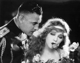 John Gilbert, Mae Murray, on-set of the Silent Film, "The Merry Widow", 1925