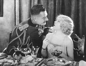 John Gilbert, Mae Murray, on-set of the Silent Film, "The Merry Widow", 1925