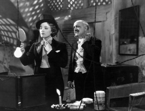 Marlene Dietrich, Paul Porcasi, on-set of the Film, "Morocco", 1930
