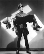 Marsha Hunt, Richard Crane, on-set of the Film, "None Shall Escape", 1944