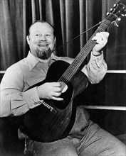 Burl Ives Playing Guitar, circa early 1950s