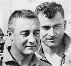 NASA Astronauts Virgil "Gus" Grissom and John Young, upon Completion of Gemini 3 Space Mission, Portrait, 1965