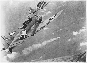 U.S. Douglas SBD-3 Dauntless Dive Bombers About to Attack Burning Japanese Cruiser Mikuma, June 6, 1942