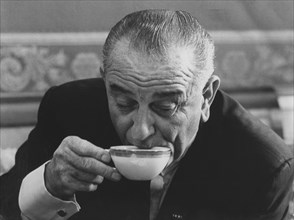 U.S. President Lyndon B. Johnson Drinking Cup of Tea, 1965