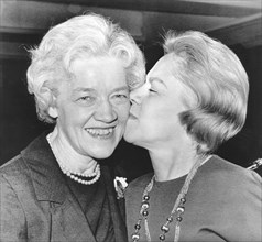 U.S. Senator Margaret Chase Smith (L) being Kissed by Sister after Announcing Run for Presidency, 1964