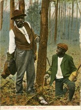 African-American Man and Boy with Snared Opossum, Series 13931, "De 'Possum Hunt - Caught", USA, Hand-Colored Postcard, circa 1910