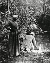 African-American Women Drawing Water from Pond, from the Film, "The Emerging Woman" Produced by the Women's Film Project, Inc