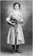Young Woman with Lace-Up Shoes Standing with Violin and Bow, Postcard, circa 1910