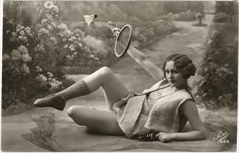 Reclining Woman Playing Badminton, French Postcard, circa 1910