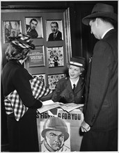 Showgirl Mary Alice Bingham Selling War Bonds and Stamps in Lobby of Winter Garden Theater before her Performance, Broadway, New York City, USA, 1943