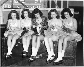 Five Female Performers of The "Ice Follies of 1943" Knitting between Numbers at Special Preview for Servicemen, Madison Square Garden, New York City, USA, 1942
