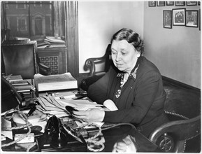 Hattie Caraway, U.S. Senator from Arkansas, Portrait at Desk, 1943