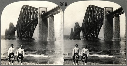 Two Male Highlanders in Native Costume Standing on the Bank of the Firth of Forth Near the Forth Rail Bridge, Queensferry, Scotland, Stereo Card, circa 1900