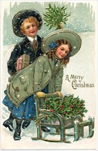 Boy and Girl with Small Sled in Snow, "A Merry Christmas", Postcard
