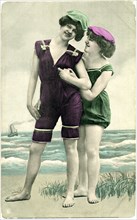 Two Smiling Women in One-Piece Bathing Suits and Caps, Portrait, Postcard, circa early 1900's