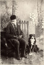 Seated Man on Bench with Dog, Studio Portrait, circa 1897