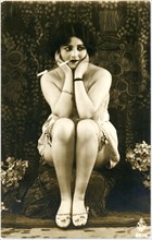 Seated Woman in Lingerie and Garters Smoking Cigarette, French Postcard