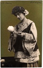 Woman in Kimono Pouring Tea into Teacup, Postcard, circa 1906