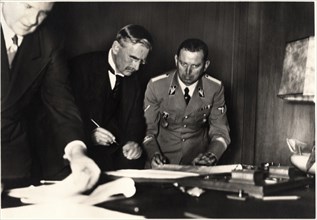 British Prime Minister Neville Chamberlain Signing Munich Agreement, Munich, Germany, September 30, 1938