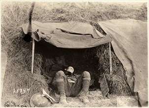 American Military Ambulance Driver Sleeping in Tent near Samogneux, France, circa 1918