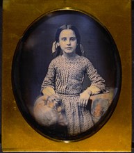 Young Girl Sitting on Stool with Arm Resting on Table, Portrait, Daguerreotype, circa 1850's