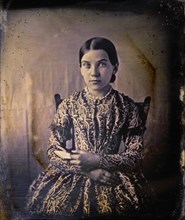 Young Teen Girl Sitting in Chair and Holding Book, Portrait, Daguerreotype, circa 1850's