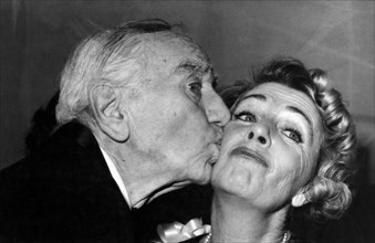 Production Supervisor Busby Berkeley kissing Ruby Keeler on Opening Night of Broadway Musical, "No, No, Nanette", 1971