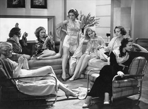 Claudia Dell, (third from left), Florence Britton, (standing), Martha Sleeper, Sylvia Sidney, (right), on-set of the Film, "Confessions of a Co-Ed", 1931
