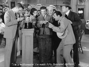 Neil Hamilton, Mary Brian, Harry Green (center), on-set of  the Film, "The Kibitzer", 1930