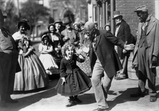 Shirley Temple and Bill Robinson, on-set of the Film, "The Littlest Rebel", 1935
