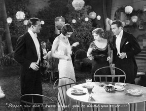 Barbara Bennett, Clara Bow, Stanley Smith, on-set of the Film, "Love Among the Millionaires", 1930