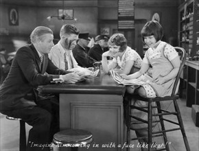 Richard "Skeets" Gallagher, Stuart Erwin, Clara Bow, Mitzi Green, on-set of the Film, "Love Among the Millionaires", 1930