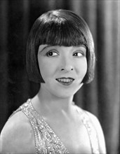 Colleen Moore, publicity portrait for the silent film, "The Desert Flower", 1925