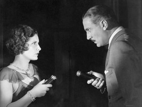 Evelyn Brent, Paul Lukas, on-set of the Film "Slightly Scarlet", 1930