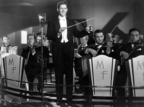 Rudy Vallee, with Orchestra on-set of the Film "Sweet Music", 1935