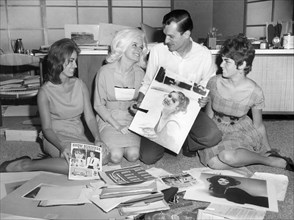 Hugh Hefner with Bunnies Marsha Sander, Cynthia Maddox, Bobbie Saperstein, Portrait, 1961