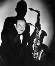 Jimmy Dorsey, Smiling Portrait with Saxophone, circa early 1950's