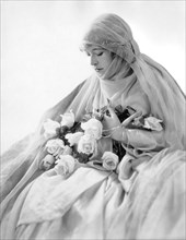 Mae Murray, Portrait with Bouquet of Roses, circa 1920's